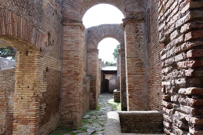 Ancient Ostia Antica Semi-Private Day Trip from Rome by Train with Guide - Forum spaces and daily commerce: more than temples and gods