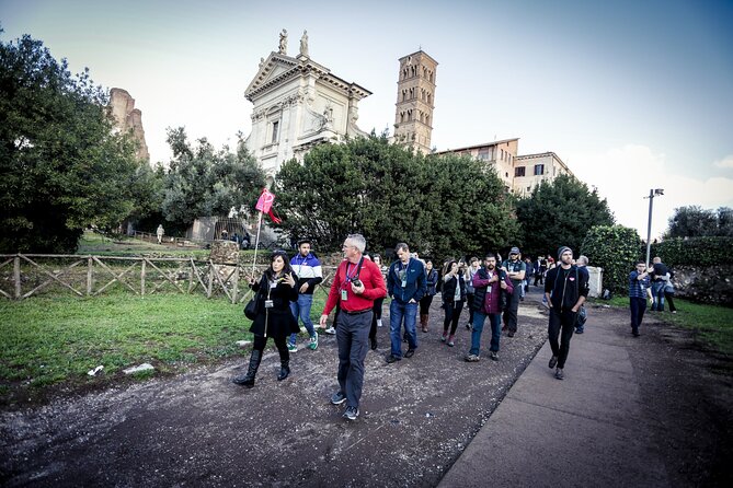 Ancient Rome Guided Walking Tour: Colosseum, Forum and Palatine - Meeting Point and Timing: Start Times, Flags, and the Move in 2025