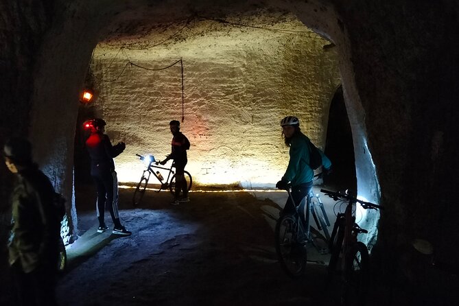 Appian Way Bike tour Underground with Catacombs & Lunch - Ninfeo di Egeria: a spring, a love story, and a pause from stone