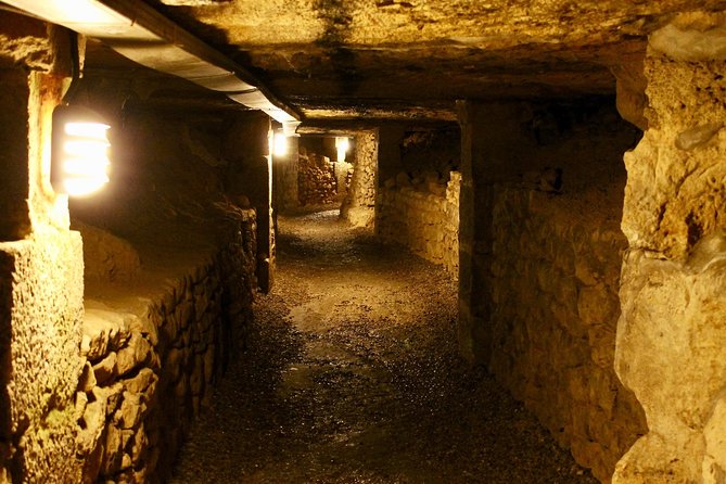 Catacombs and Hidden Underground Rome: Small Group Max 6 People - Catacombe di Domitilla: narrow tunnels, empty graves, and the feel of burial space