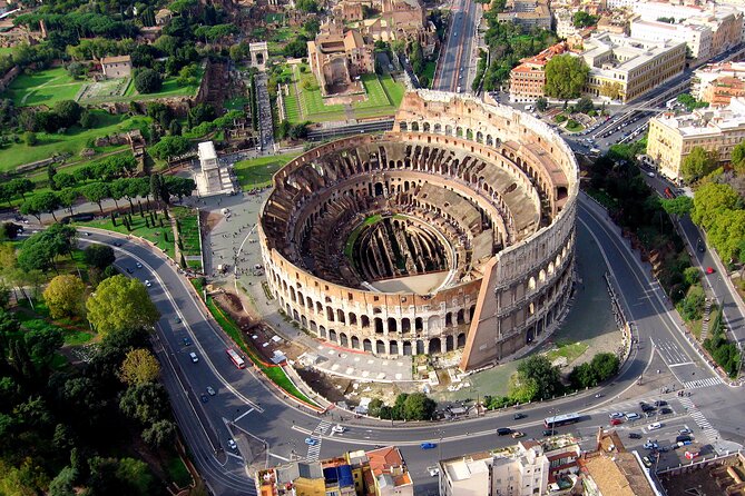 Colosseum Gladiator's Arena and Ancient Rome VIP Guided Tour - Roman Forum stop: Julius Caesar’s temple and the “center of everything”