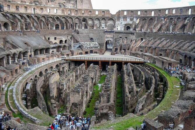 Colosseum Guided Tour with Access Roman Forum and Palatine Hill - Entering the Colosseum: Tickets, Headsets, and What to Expect