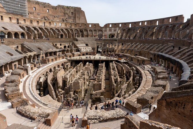 Colosseum Guided Tour with Access Roman Forum and Palatine Hill - Entering the Colosseum Arena Floor Through the Gate of Death