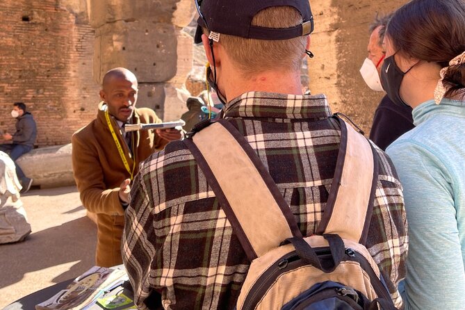 Colosseum, Palatine Hill and Roman Forum Guided Group Tour - The pace: headphones help, but crowds still set the tempo