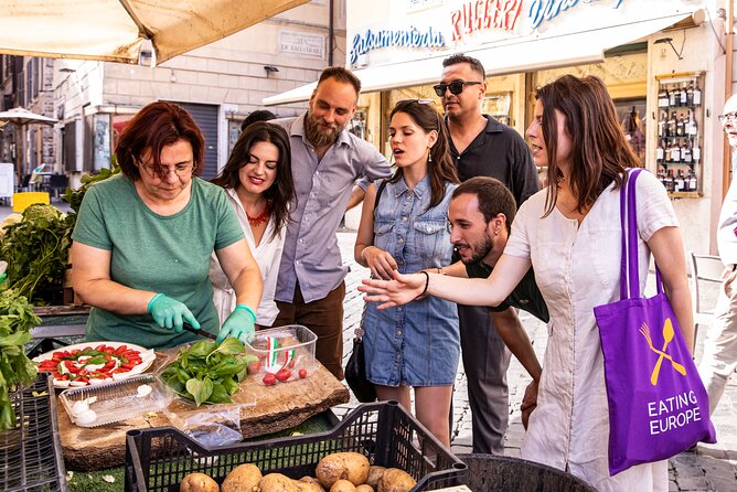 Eternal Rome Food Tour: Campo de Fiori, Jewish Ghetto, Trastevere - Trastevere at Trattoria Da Enzo: Jewish-style fried artichokes to go