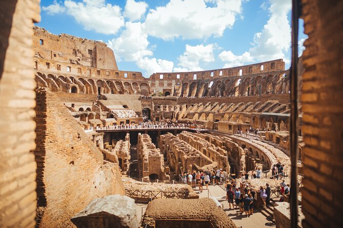 Last Entry Colosseum, Arena Access, Rooftop Aperitif Private Tour - Entering the Colosseum arena floor
