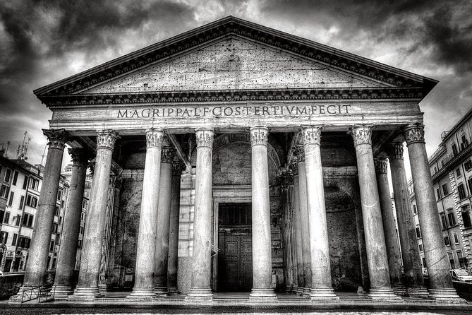 Pantheon Private Guided Tour - Rome's Iconic Ancient Temple - Piazza della Rotonda: Jacopo Della Porta’s fountain and an obelisk with a crucifix