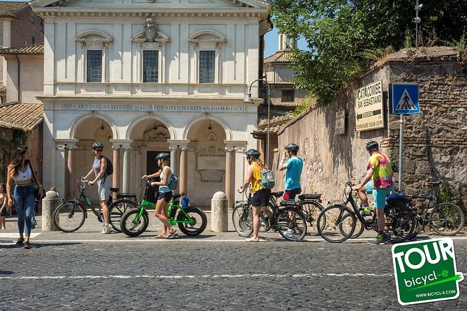 Rome: Appian Way E-bike Tour, Catacombs, Aqueducts & Transfer - Baths of Caracalla from the comfort of the minivan