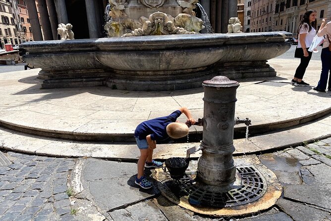 Rome at Sunrise Walking Tour: Pantheon Trevi Fountain & Breakfast - Trevi Fountain at first light: beautiful even with maintenance