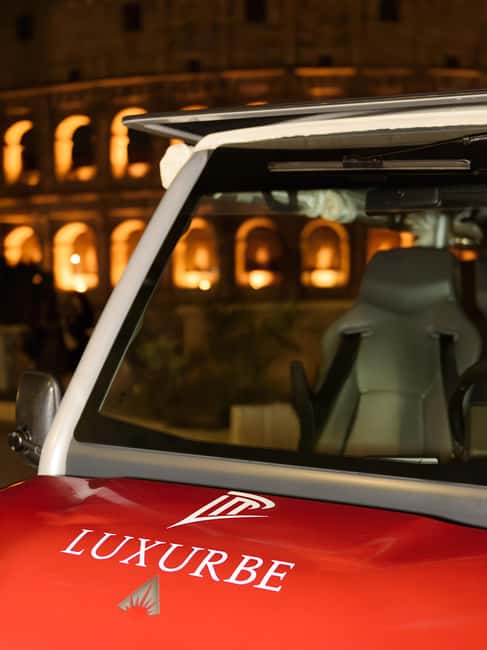 Rome: City Golf Cart at Night Tour - Colosseum lit up, with breathing room for photos