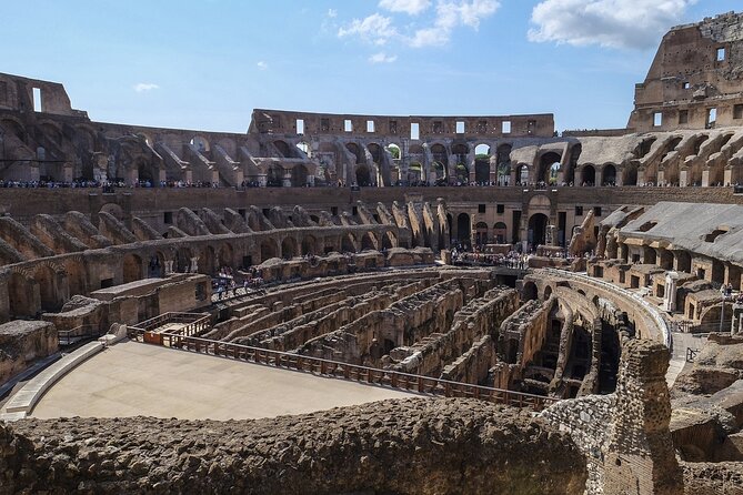 Rome: Colosseum, Forum, & Palatine Hill with Audio Guide - Entering the Colosseum with an audio plan