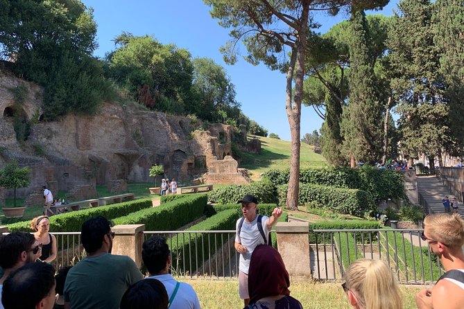 Rome: Colosseum, Palatine Hill and Roman Forum Group Tour - Roman Forum walking: Via Sacra, Via Nova, and the center of empire