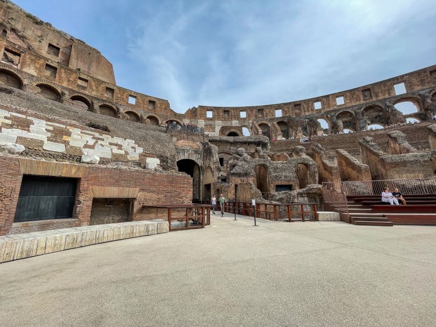 Rome: Colosseum Tour with Access to the Gladiator Arena - The podium for important Romans and the main arena view