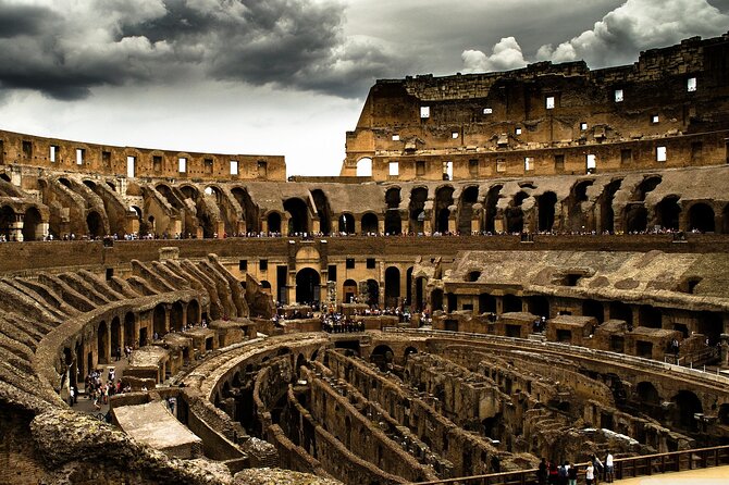 Rome: Colosseum Underground Full Experience Tour - Underground level: tunnels, chambers, and the show mechanics