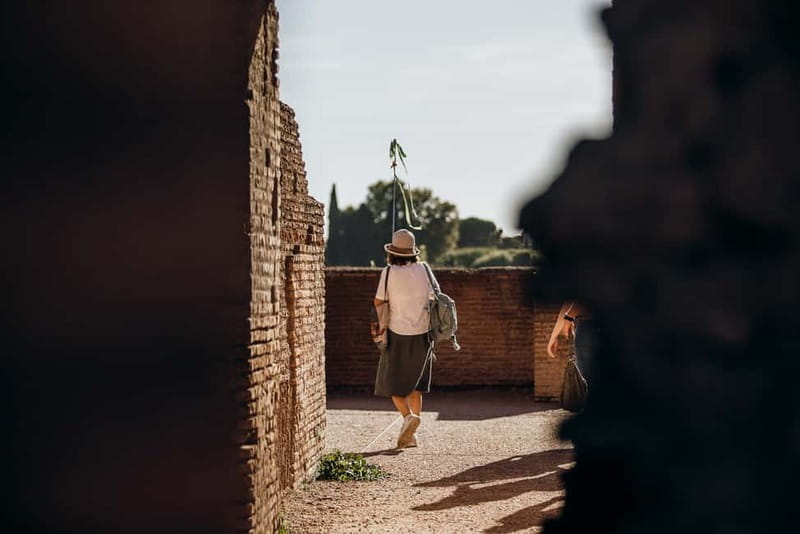 Rome: Complete Colosseum Tour with Different Sites Options - Small-group touring, headsets, and the role of the guide