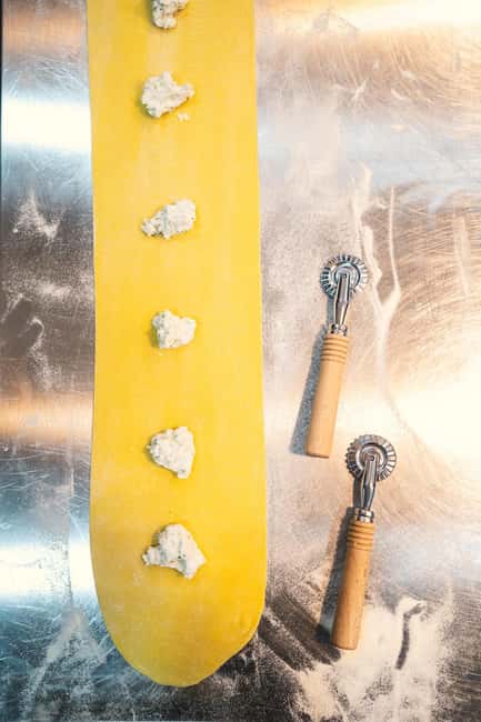Rome: Fresh Pasta-Making Class with Italian Chef and Wine - The setting: where you meet and what the kitchen vibe is like
