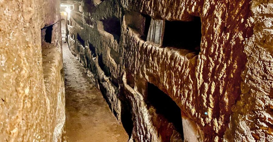 Rome: Guided Roman Catacombs Tour with Transfers - Catacombs of San Domitilla, the 16-metre descent that sets the mood