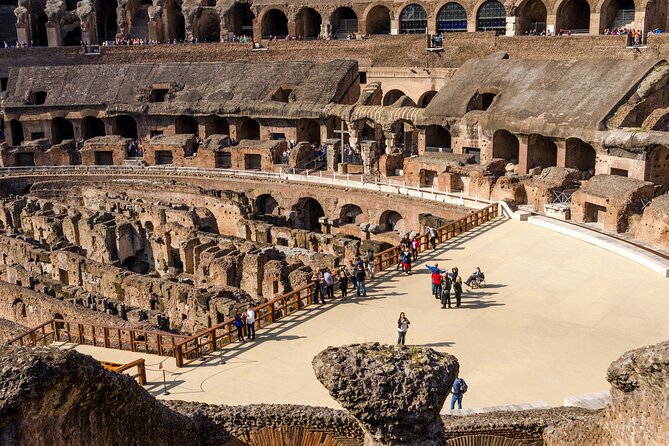 Rome: Guided Tour of Colosseum, Palatine Hill and Roman Forum - Following Via Sacra into the Roman Forum’s power center