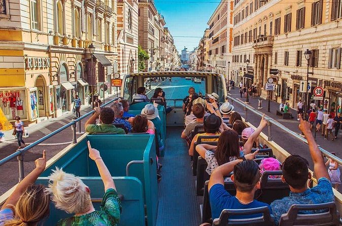 Rome Panoramic Bus Tour & Colosseum Arena Visit with Audio Guide - Meeting point, IDs, and the name-match rule that can block entry