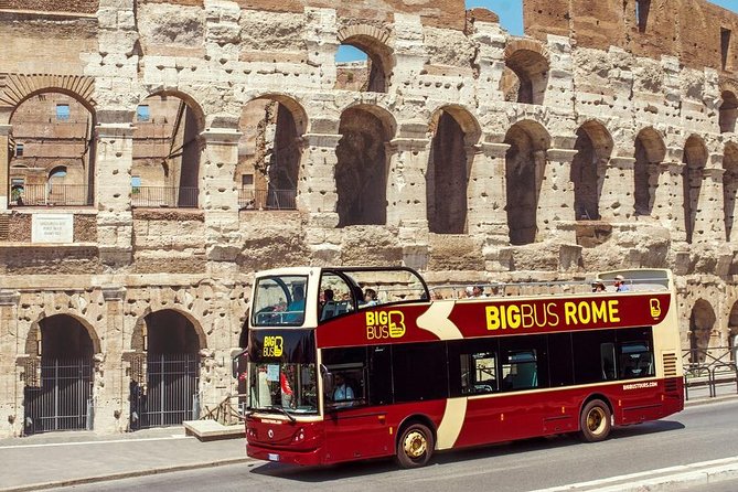 Rome Panoramic Bus Tour & Colosseum Arena Visit with Audio Guide - Audio guide plus smart explanations: what to listen for