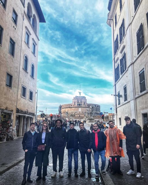 Rome: Piazza del Popolo and City Sights Free Walking Tour - Porta del Popolo: The Marble Details People Miss