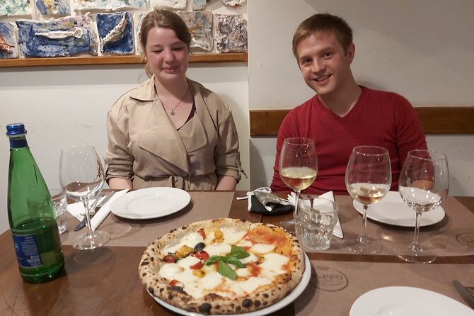 Rome: Pizza & Tiramisu Class with Free Flowing Fine Wine - Margherita shaping, topping basics, and that wood-fired bake