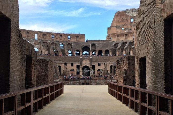 Rome: Private Colosseum, Arena and Underground Tour with Pick-Up - Entering the Colosseum underground and stepping onto the arena floor
