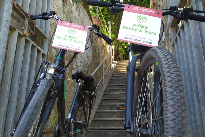 Rome Tiber cycle path: Electric & Muscle Rental Bike - Gear that reduces friction: helmet, lock, pump, and smart add-ons