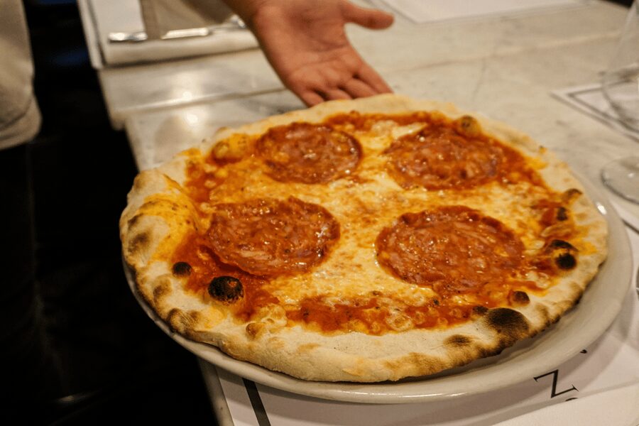 Rome: Traditional Pizza Cooking Class near Piazza Navona - Making Roman pizza: from dough basics to topping confidence
