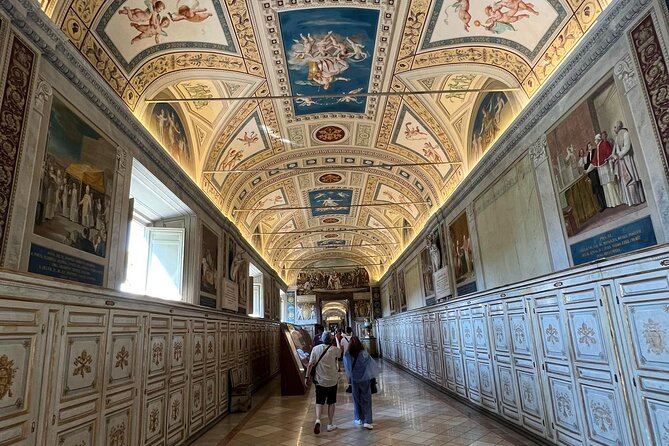 Rome: Vatican Museum and Sistine Chapel Reserved Entry - Vatican Museums: Maps, Sculptures, and the Pinecone Courtyard Build-Up