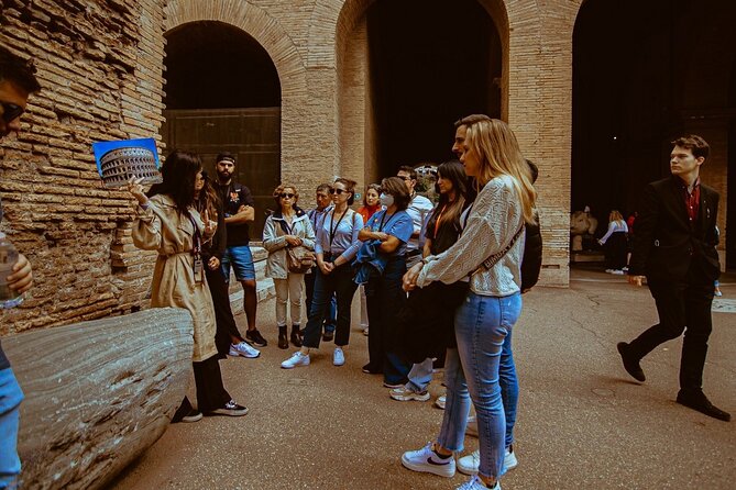 Small group Colosseum with Arena Floor, Palatine Hill & Forum Tour - Roman Forum center: politics, religion, economy, and law