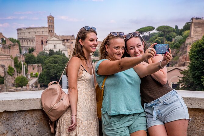 Small Group Tour of Colosseum and Ancient Rome - Entering the Colosseum: gladiators, arena views, and smart photo stops