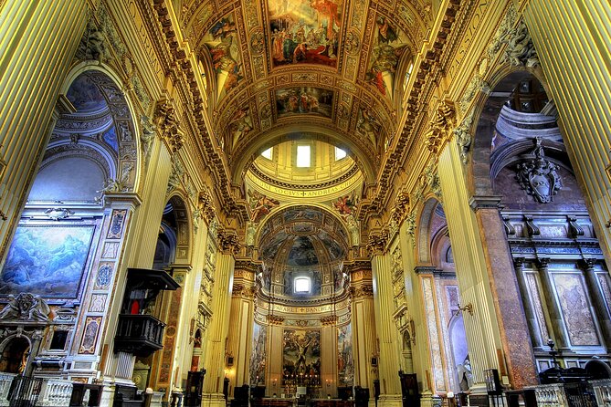 St. Peter's Basilica and Papal Grottoes Guided Tour - Inside St. Peter’s Basilica: gold ceilings, marble floor color, and the main artworks