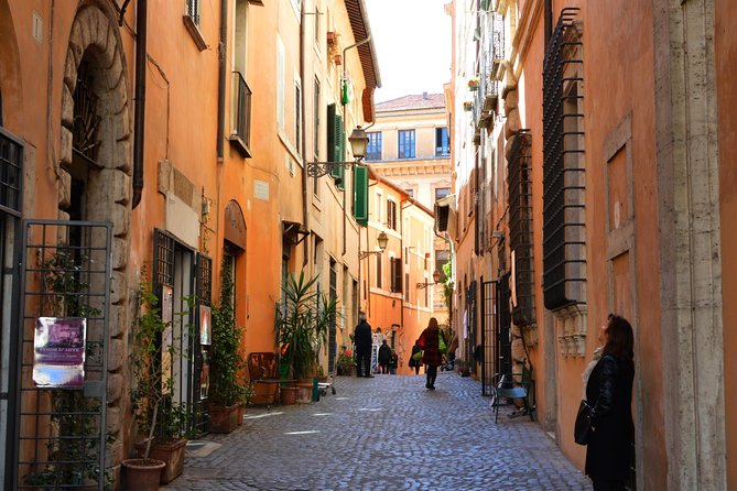 Trastevere and Rome Jewish Ghetto Small Group Walking Tour - Travel to Tiber Island: Romulus and Remus in the middle of the river